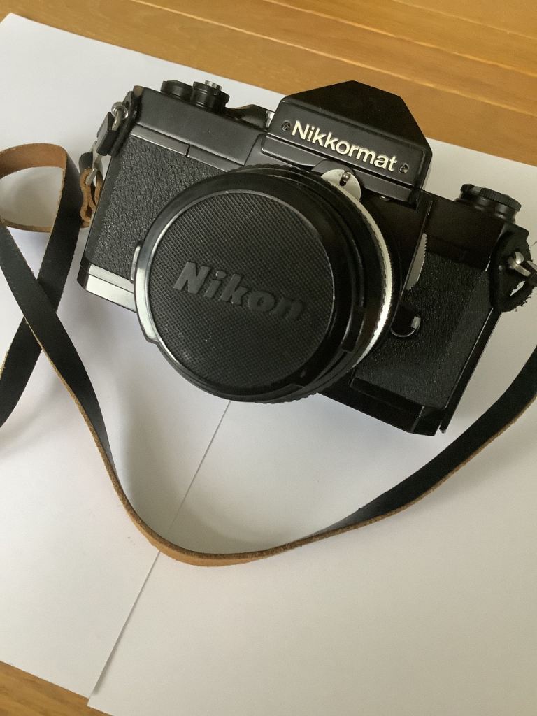 Nikon Nikkormat FT2 Film Camera and Unomat Flashgun and Coloured Filters.