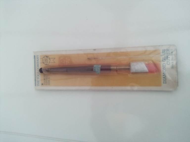 New. The Tool Company diamond tipped, size 4 glass cutter.