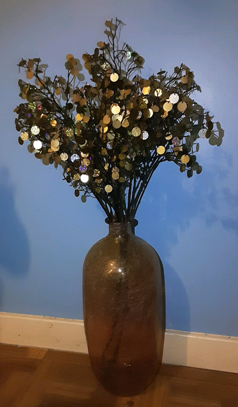 Large gold glass vase with gold and silver disc branches