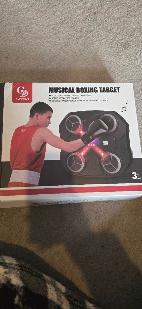 Space saver bluetooth Musical boxing punching machine. 
