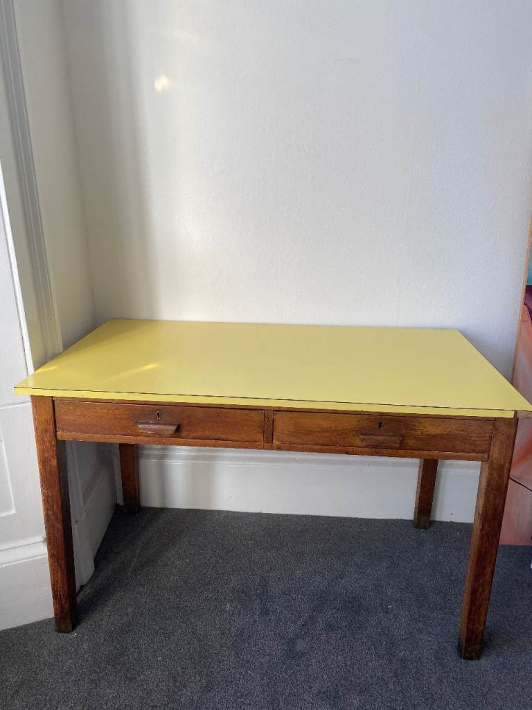 Solid wood desk with yellow top and two drawers 