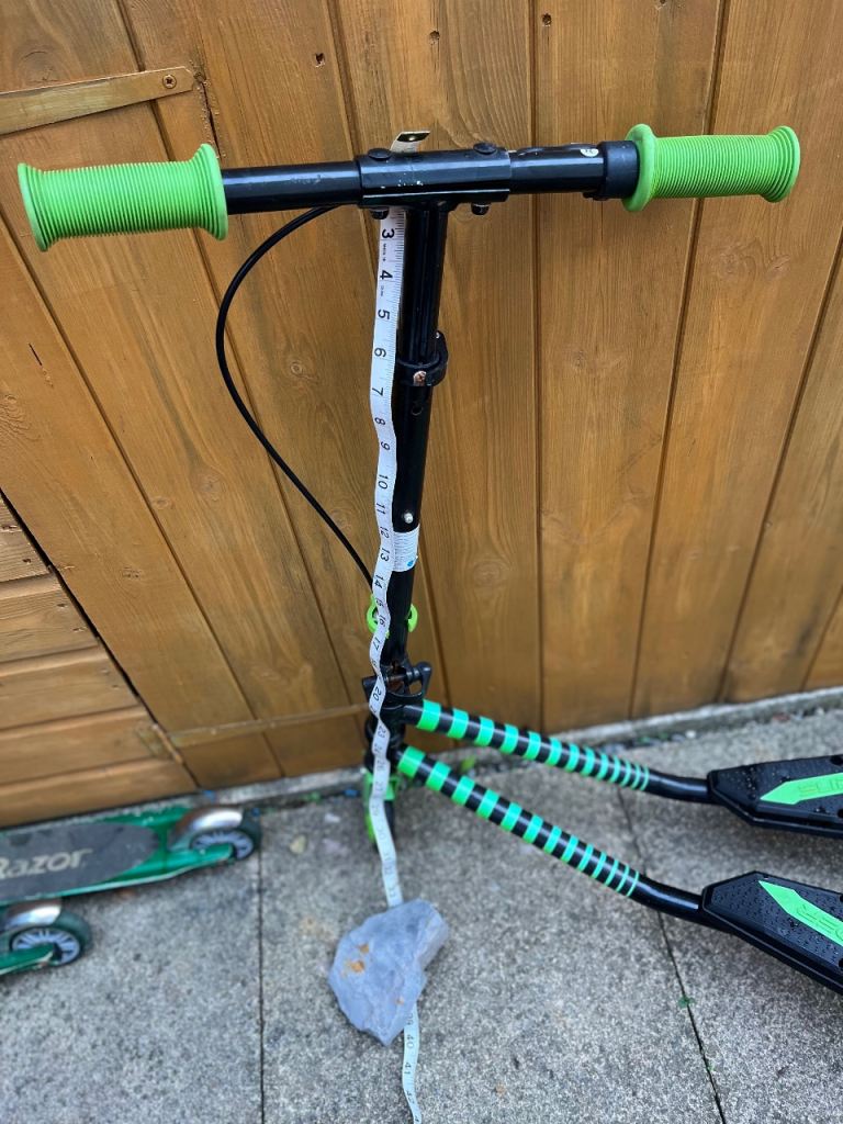 Black and Green Side-by-Side Scooter – Good Condition