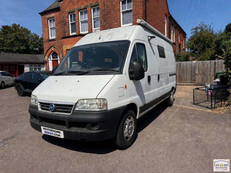 Fiat Ducato camper van for sale - 2 berth - 2 belts - end washroom 