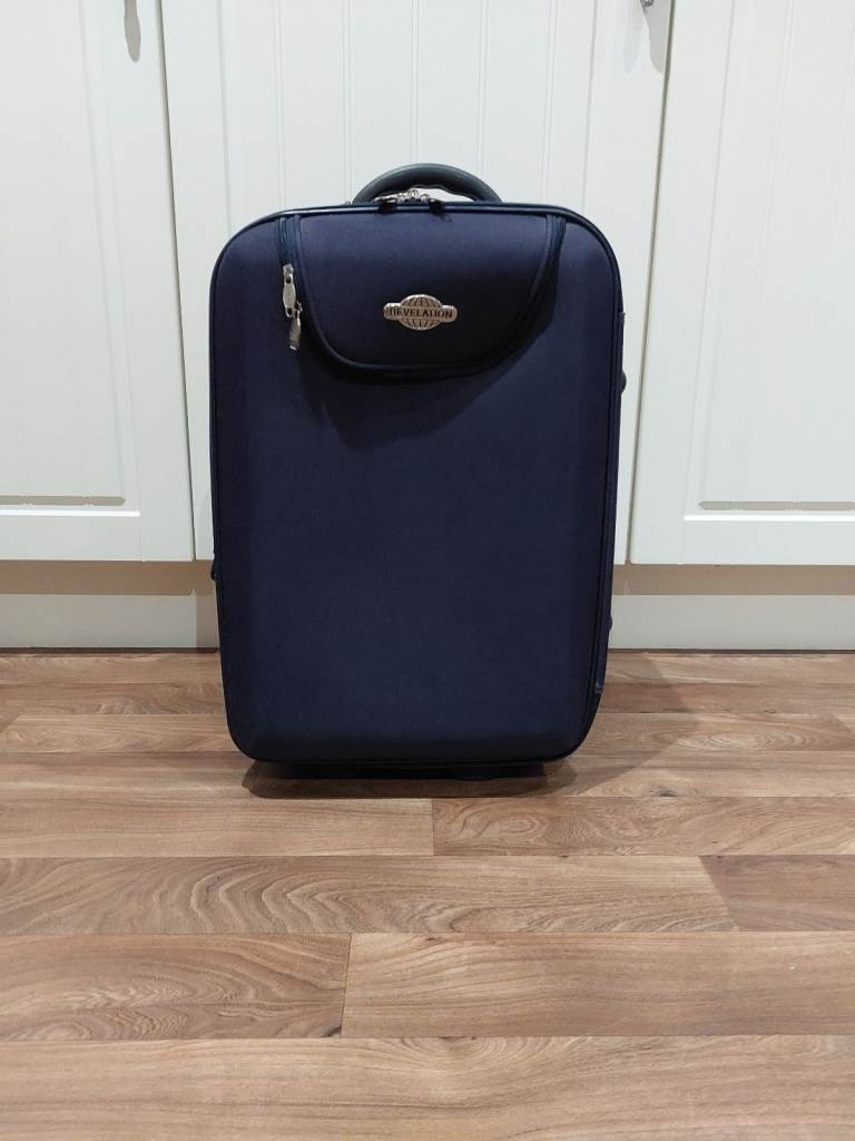 JUST REDUCED - expensive (RRP£45) small blue suitcase seldom used in v good condition/56x36cmsx20cms