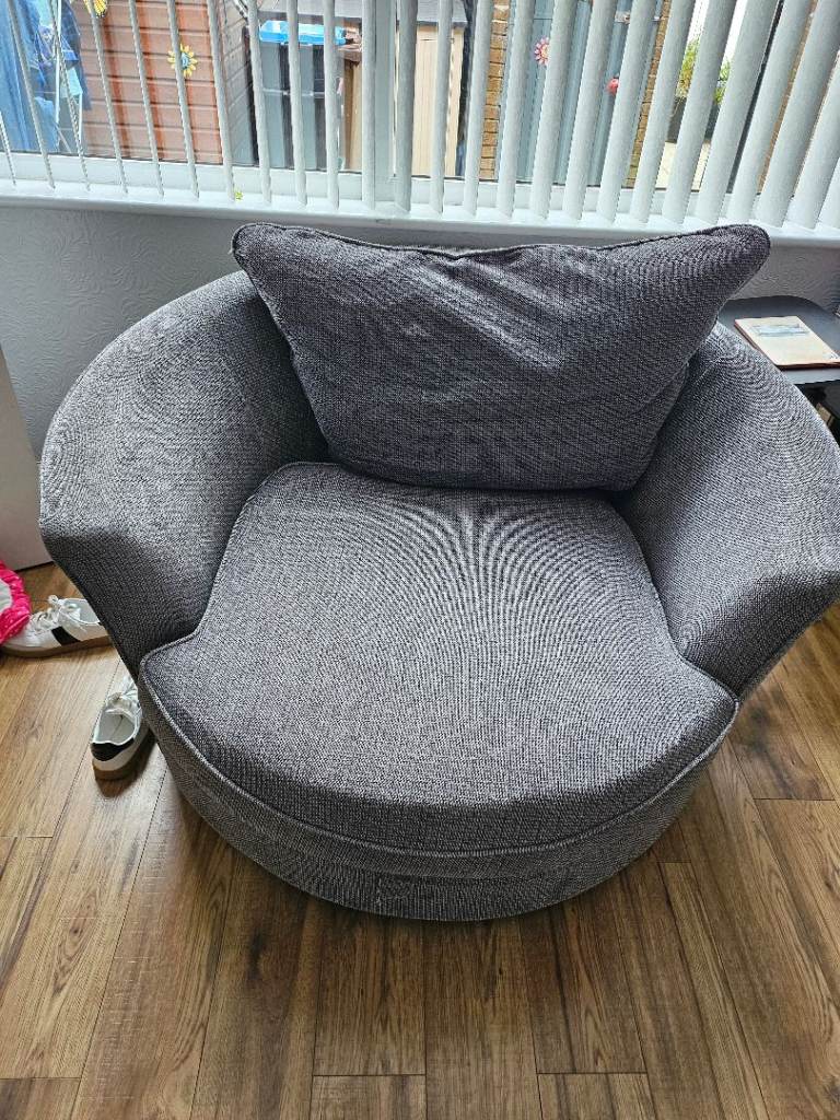 Comfy Grey Swivel Armchair with Cushion – Good Condition