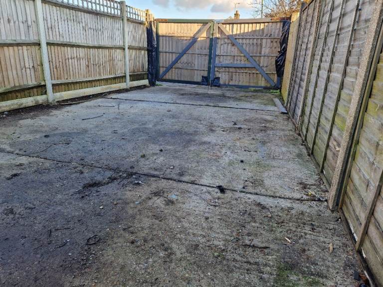 Parking Land with large storage Shed.