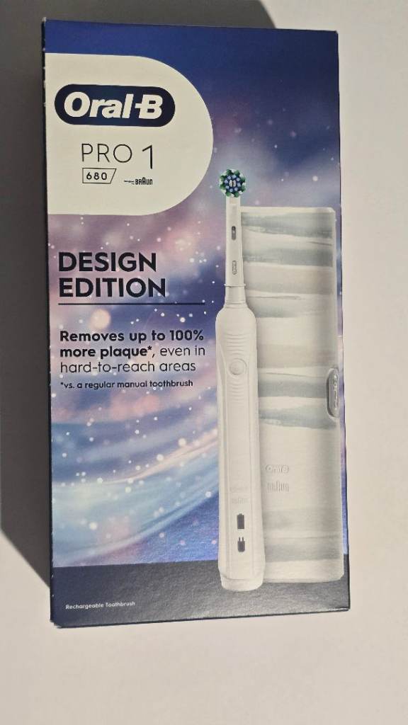 NEW Oral-B Pro 1 White Electric Toothbrush £35 ono