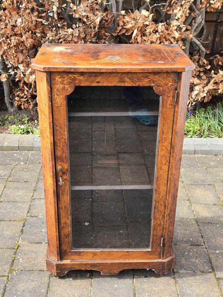 Antique glazed display cabinet with inlay details