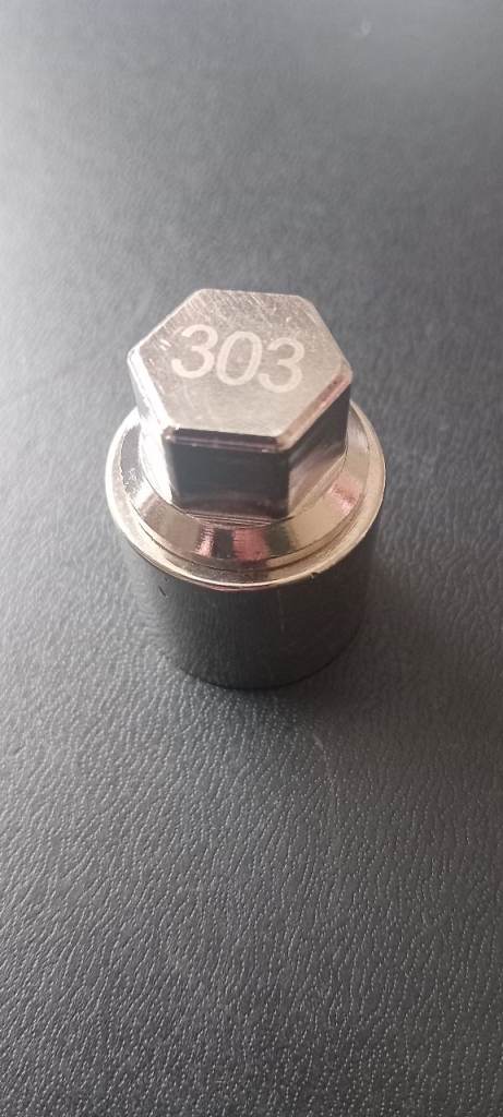 Mercedes-benz wheel locking key nut. 