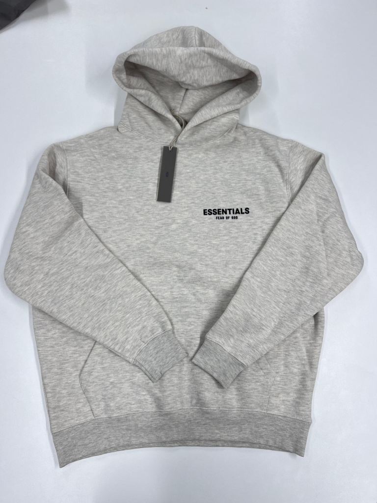 Man’s Grey Fear of God Essentials hoodie