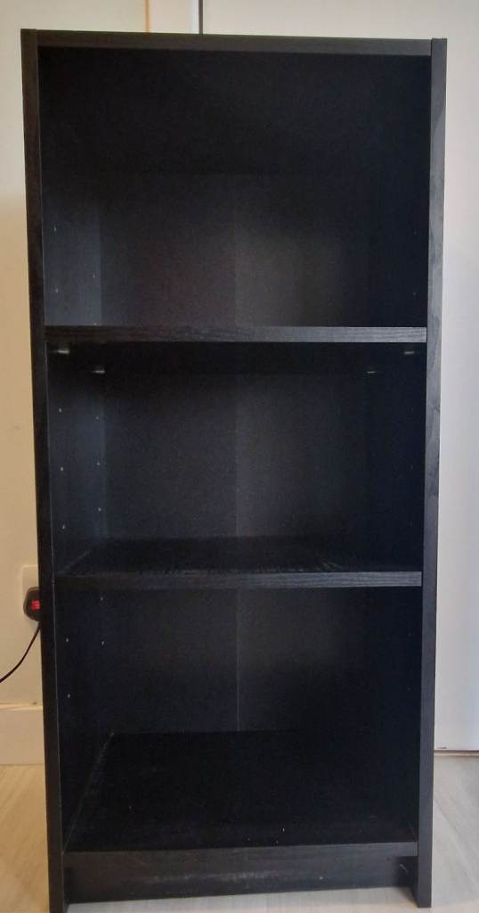 Narrow black bookcase in excellent condition