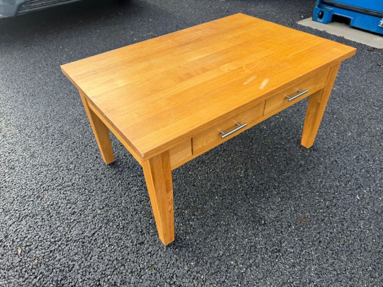 Solid oak coffee table with four drawer possible delivery  