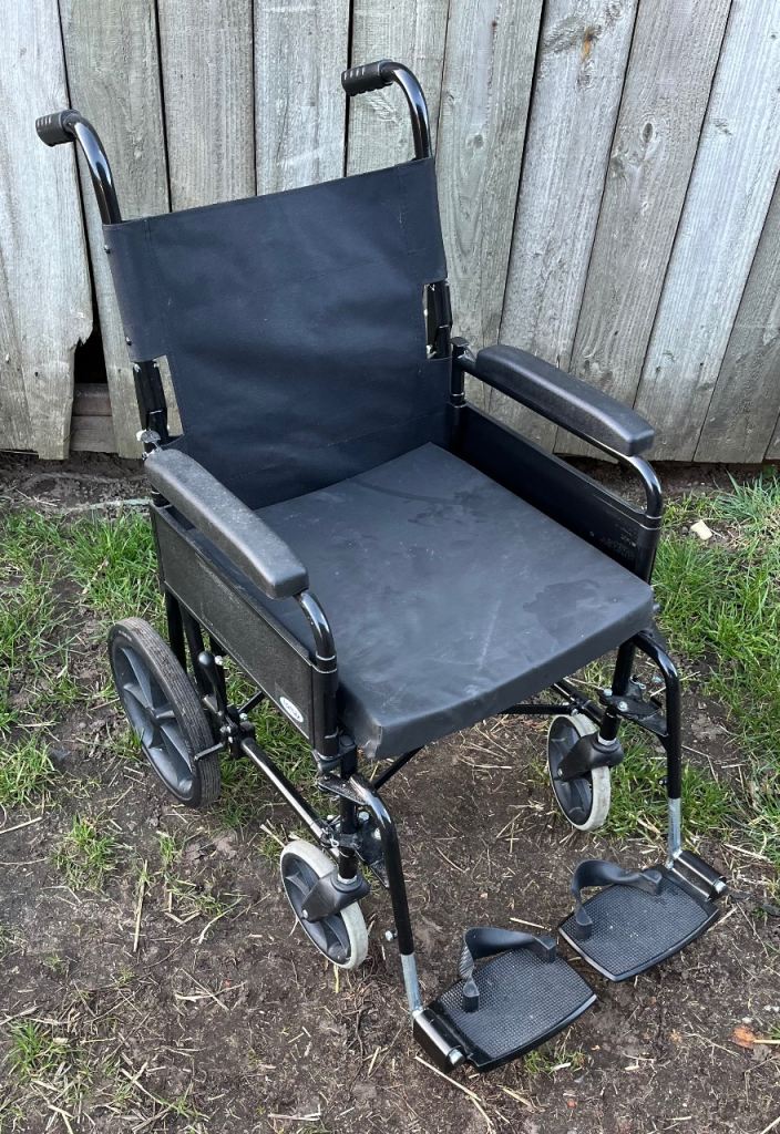 Folding wheelchair with cushion 