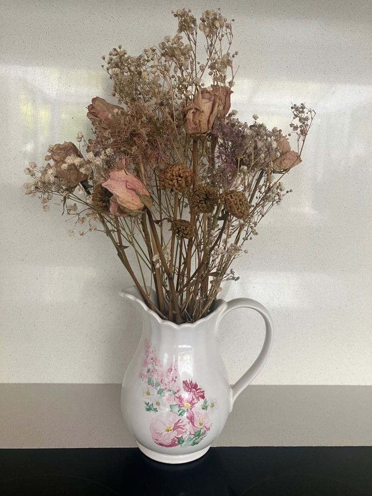 Small white floral jug/vase with dried flowers