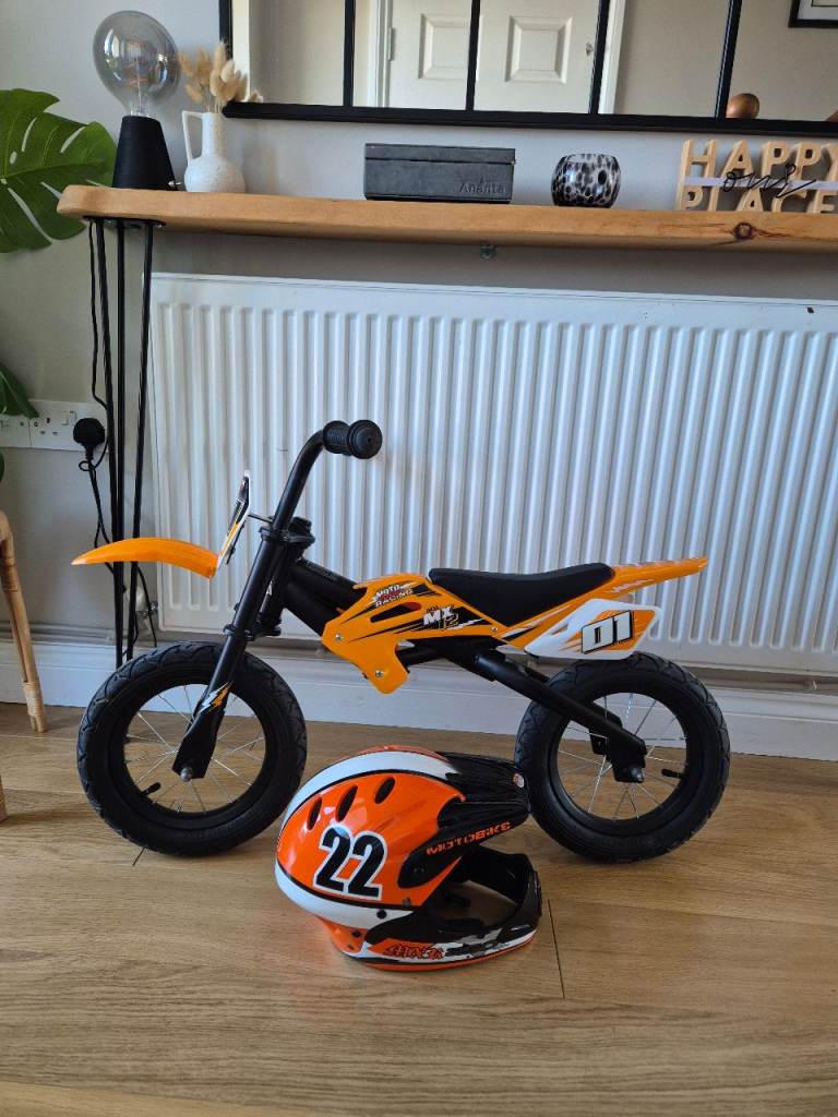 Motorbike balance bike 12" and helmet 