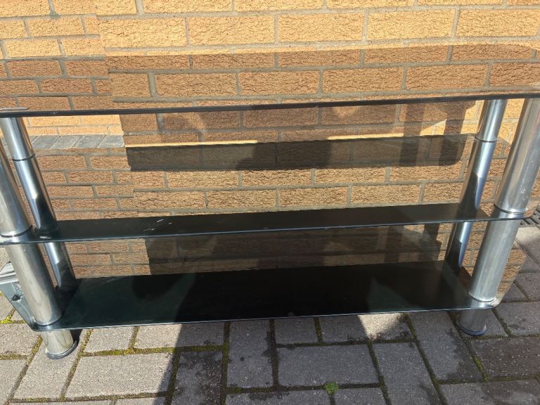 Free black glass tv unit with chrome legs 