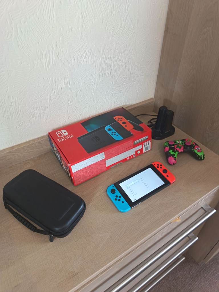Nintendo Switch 32GB Boxed with case and extra controller
