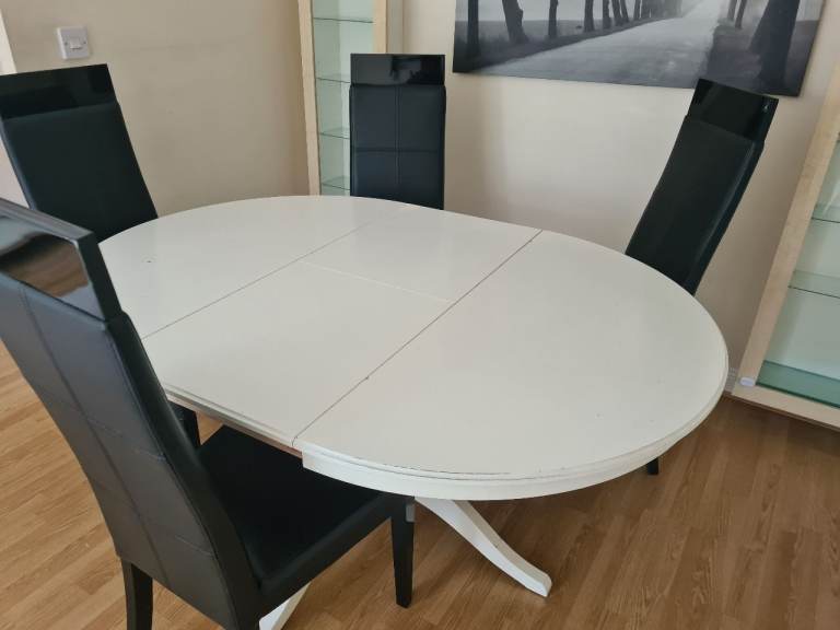 Extending Ikea White Round into Oval Dining Table and 4 Black Chairs 