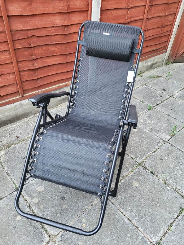 Brand new pair of garden recliners with labels