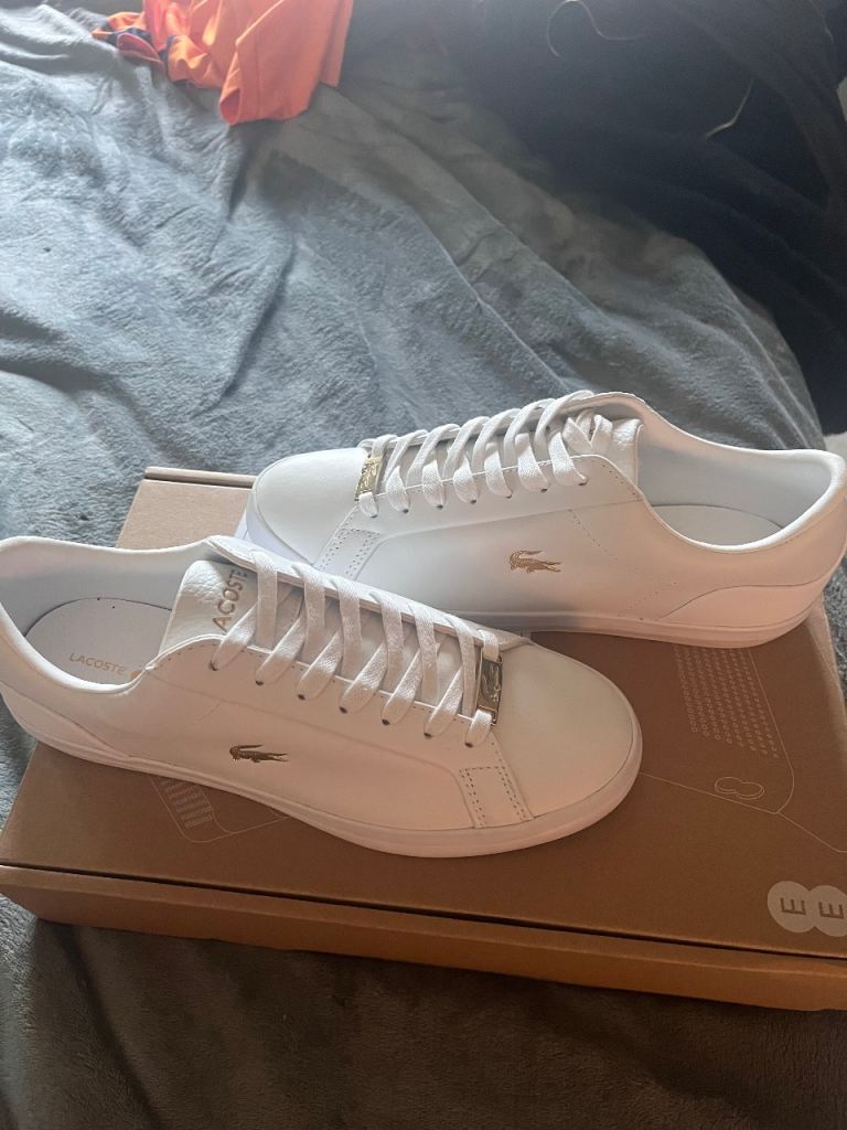 Lacoste white and gold trainers