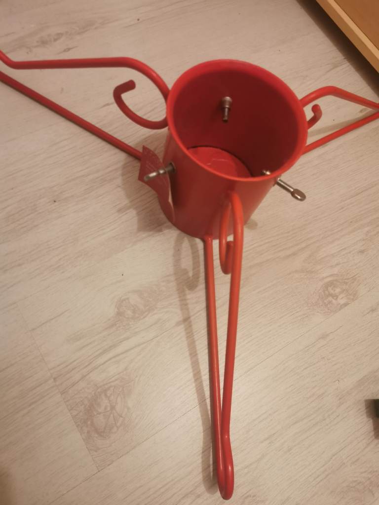 Large red metal xmas tree stand