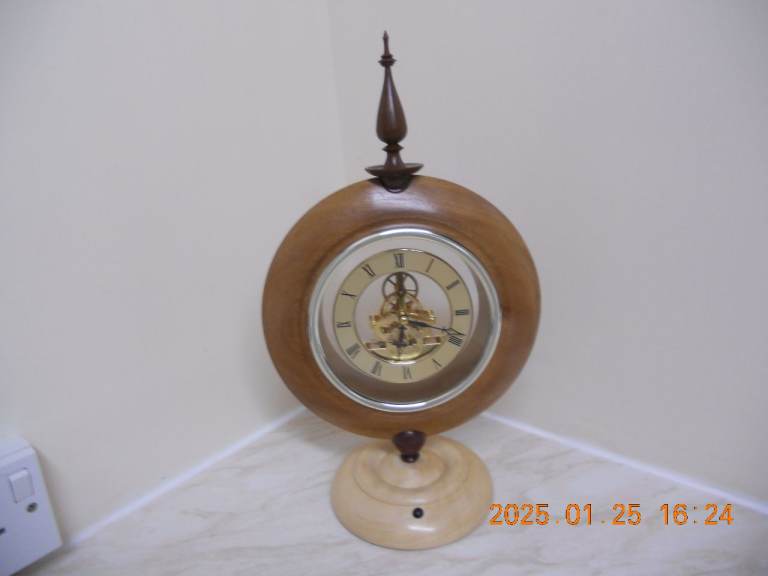 PEDISTAL SKELETON CLOCK Crafted with meticulous attention to detail. . 