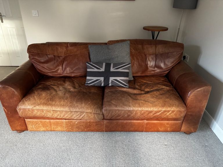 Two Brown Leather Two-Seater Sofa’s