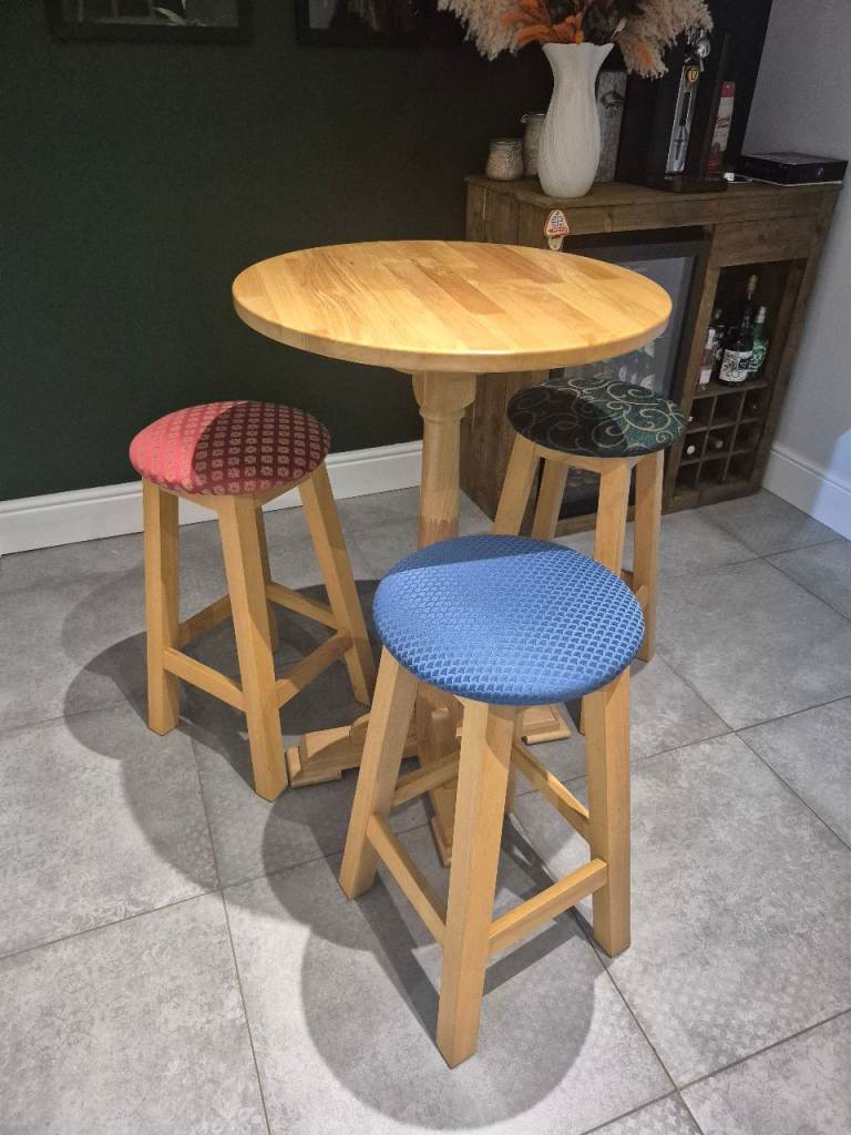Round wood poseur table with stools
