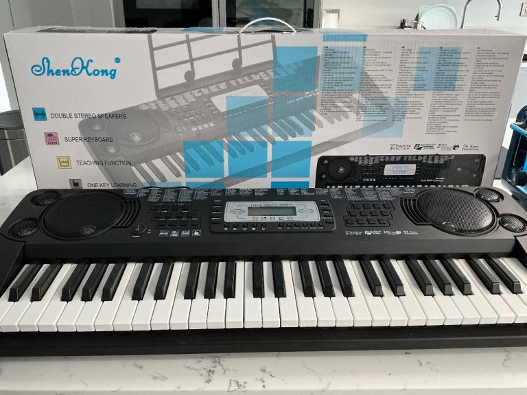ELECTRONIC SK-560 SHEN KONG KEYBOARD WITH PADDED STOOL AND STAND ALL BOXED AS NEW