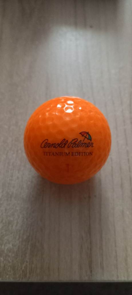 Arnold Palmer golf ball.
