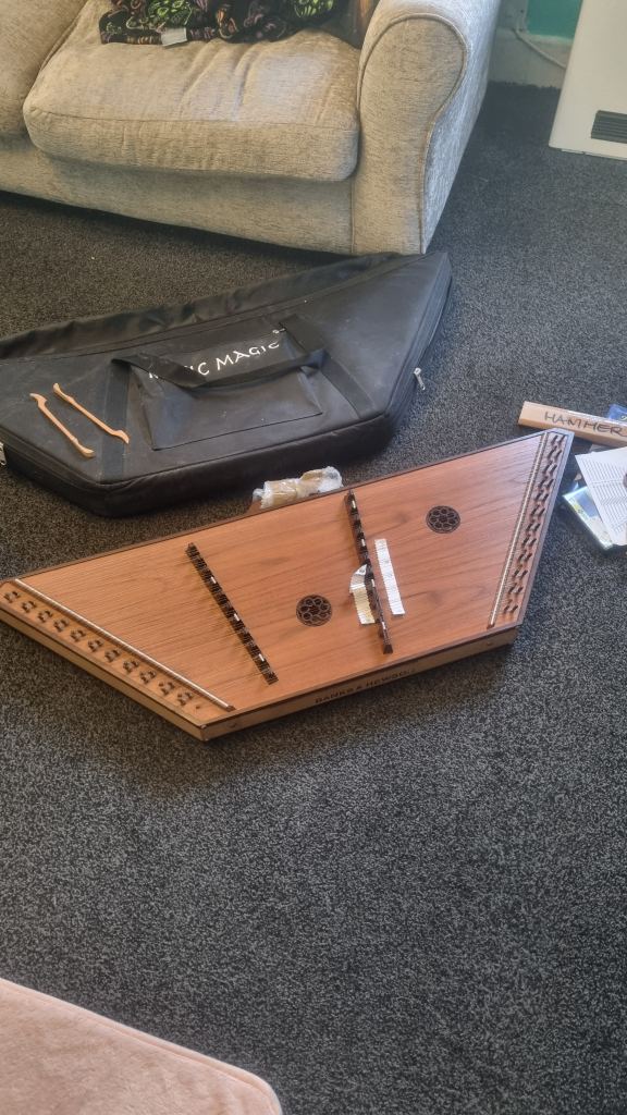 Wooden hammered dulcima mudical piece