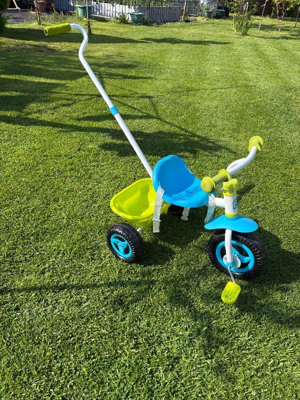 Trike with pedal lock and push bar