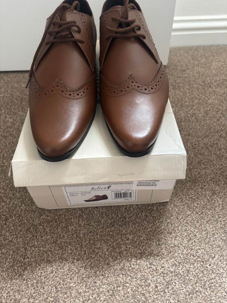 Brand new and boxed On Fire brown shoes, size 8. Brand new. £13 ono for quick sale.