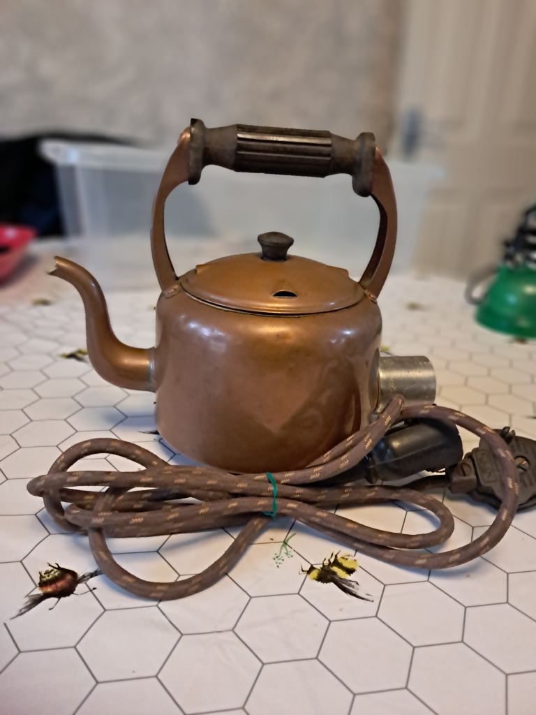 Antique copper electric kettle.  