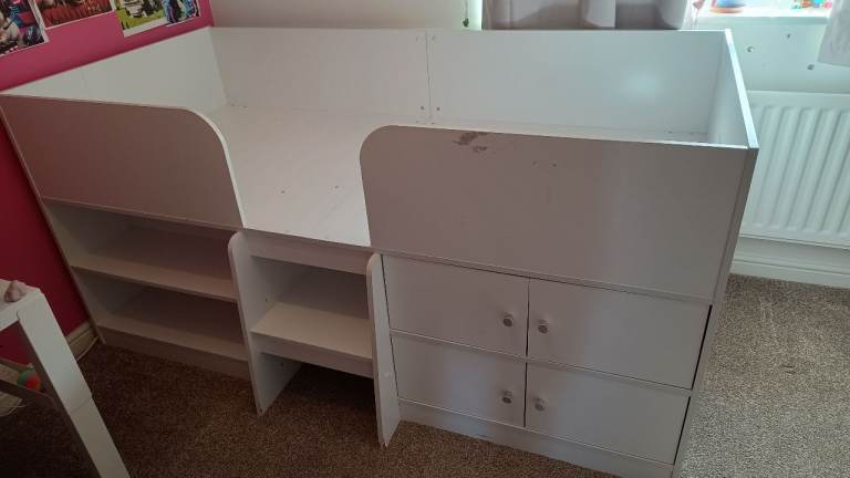 High bed with storage space