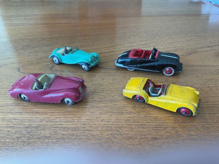 SET OF 4 DINKY CARS 1950’s.  Sunbeam Alpine, Austin Atlantic, MG Midget,  Triumph TR2