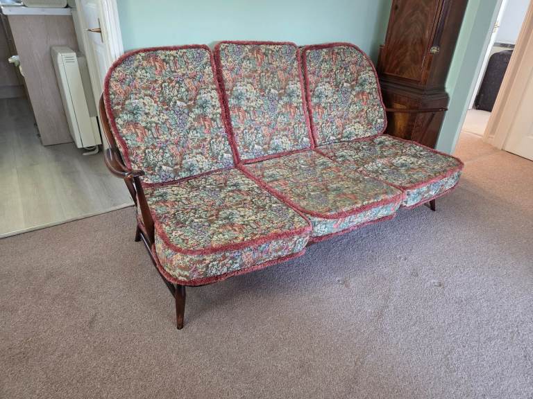 Ercol 1966 solid wood sofa and chairs
