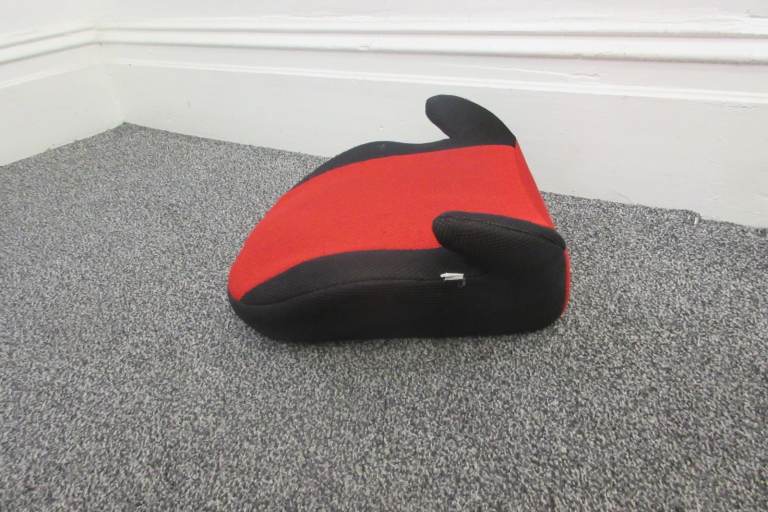 Black and red Booster seat.