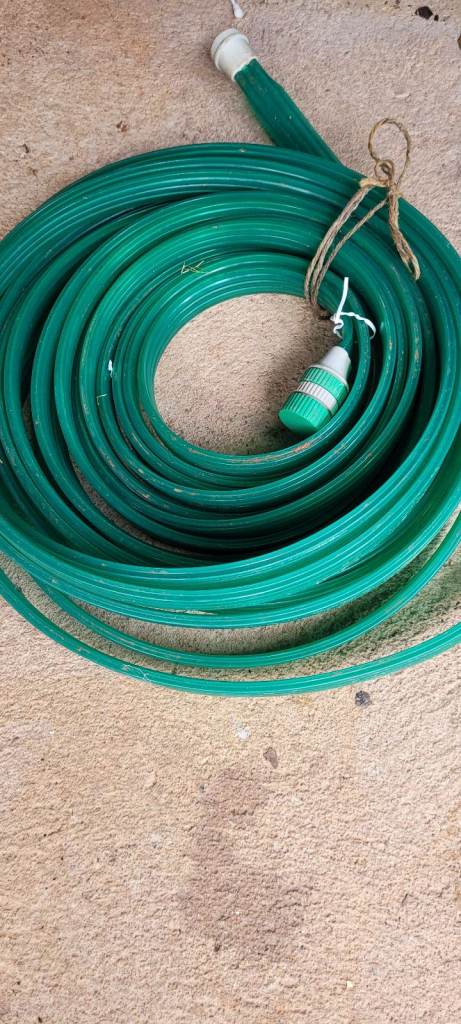 Flat hose pipe...unused..a bit dusty!