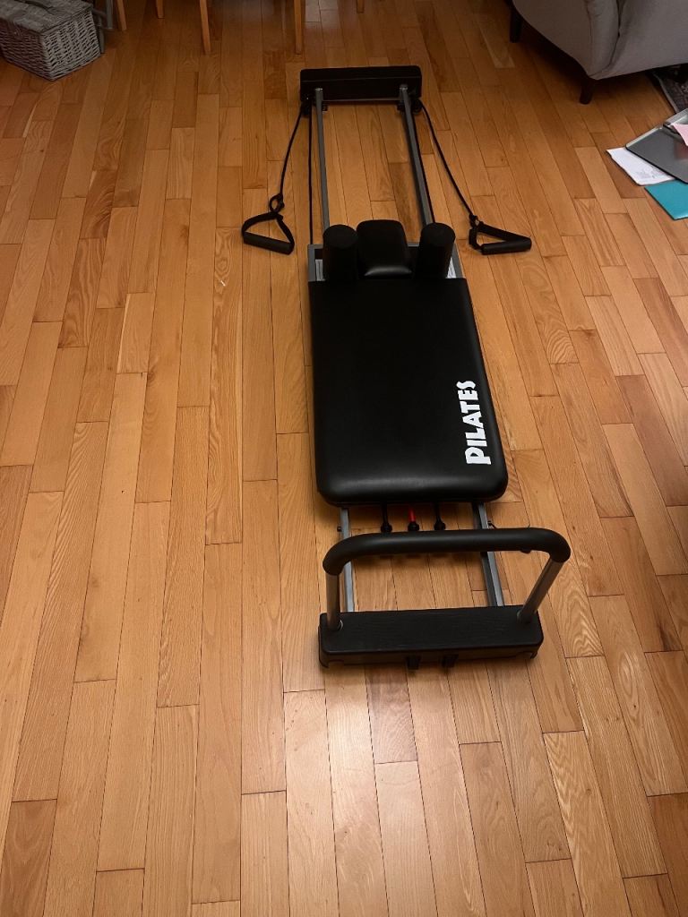 Pilates reformer and dvd set and player