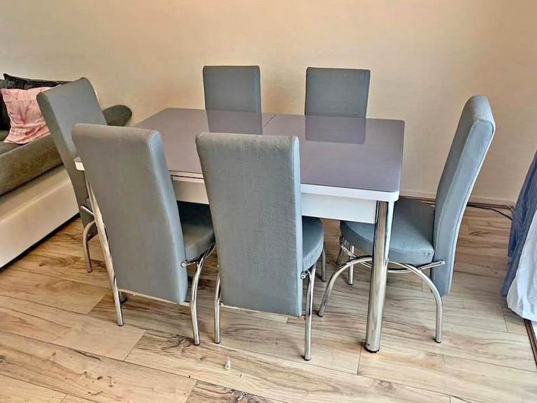 New grey table with 6 chairs with silver legs order now