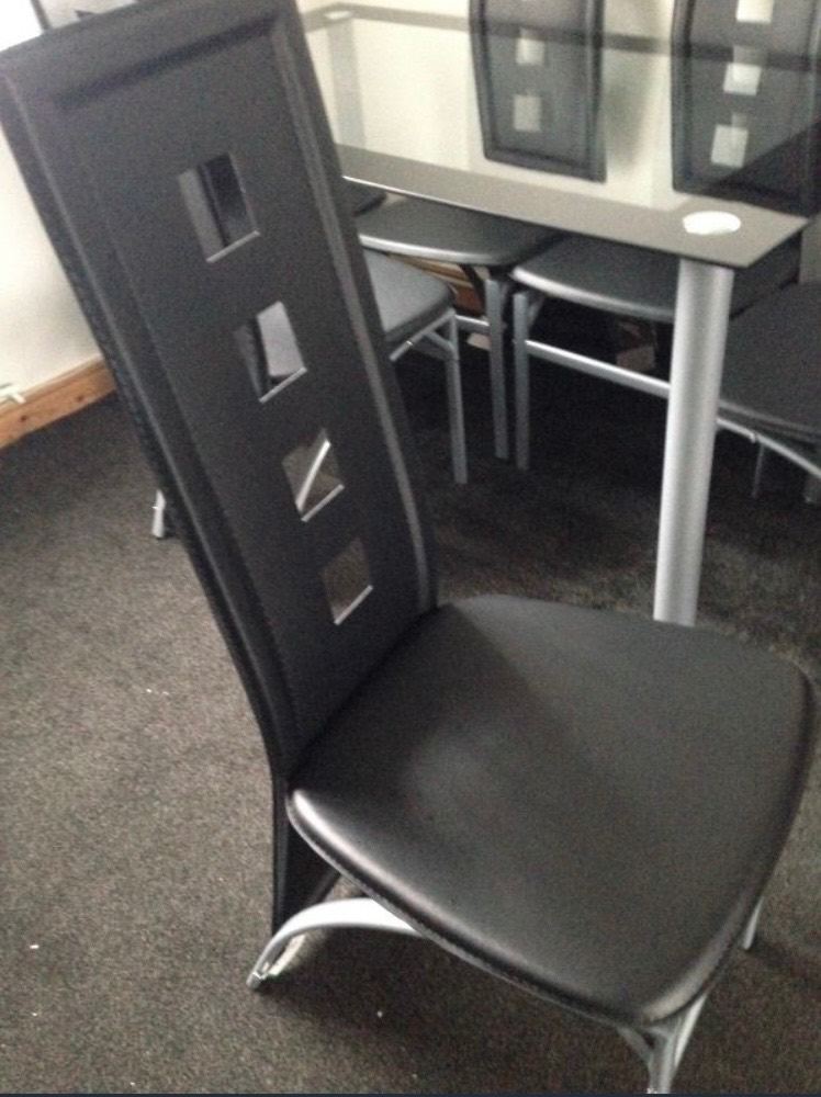Chairs (dinning chairs black faux leather)
