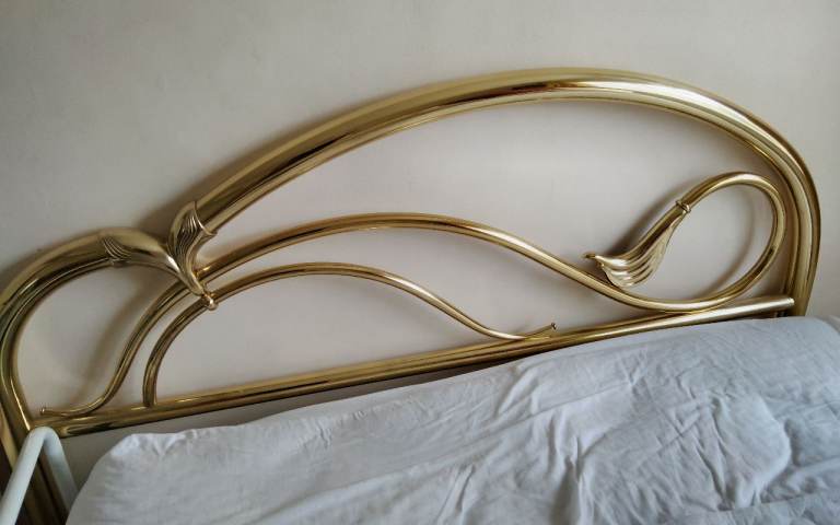 Brass headboard for double bed
