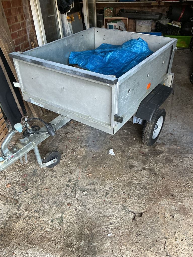 Small camping or tip run sized trailer,stored so fitted new tyres and new wheels too
