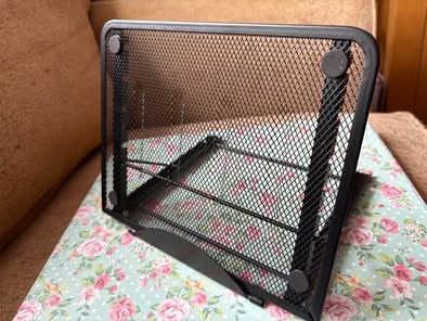 Ventilated Adjustable Ergonomic Laptop Stand. Size: 24cm x 19cm. Adjustable metal mesh laptop stand