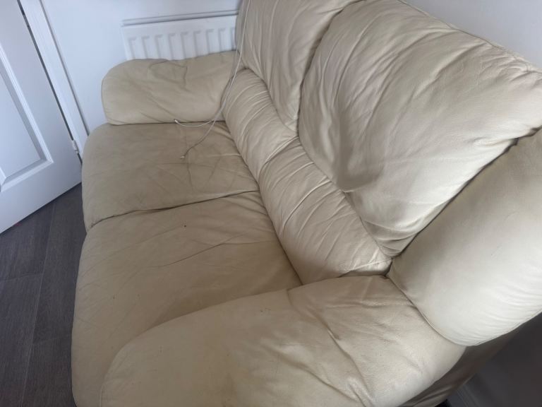 Two seat leather sofa and armchair 