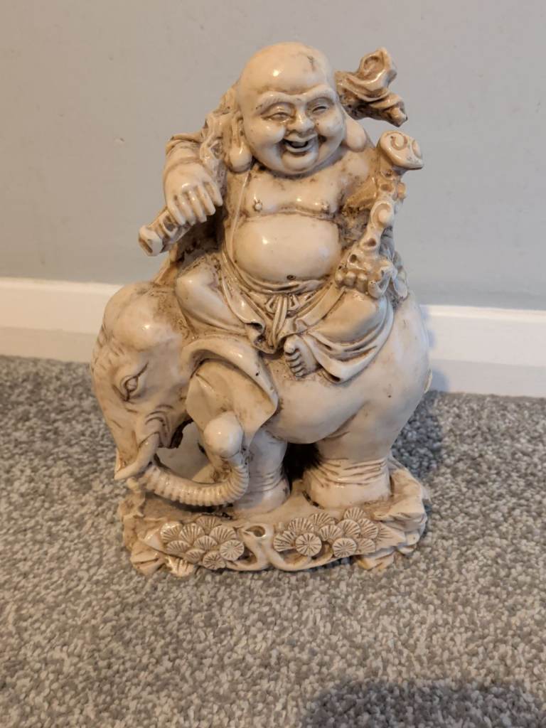 Resin Buddha on an elephant