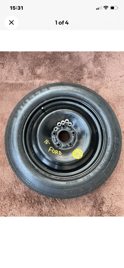 Ford 16” space saver wheel and Pirelli tyre unused plus 5 steel wheel nuts 