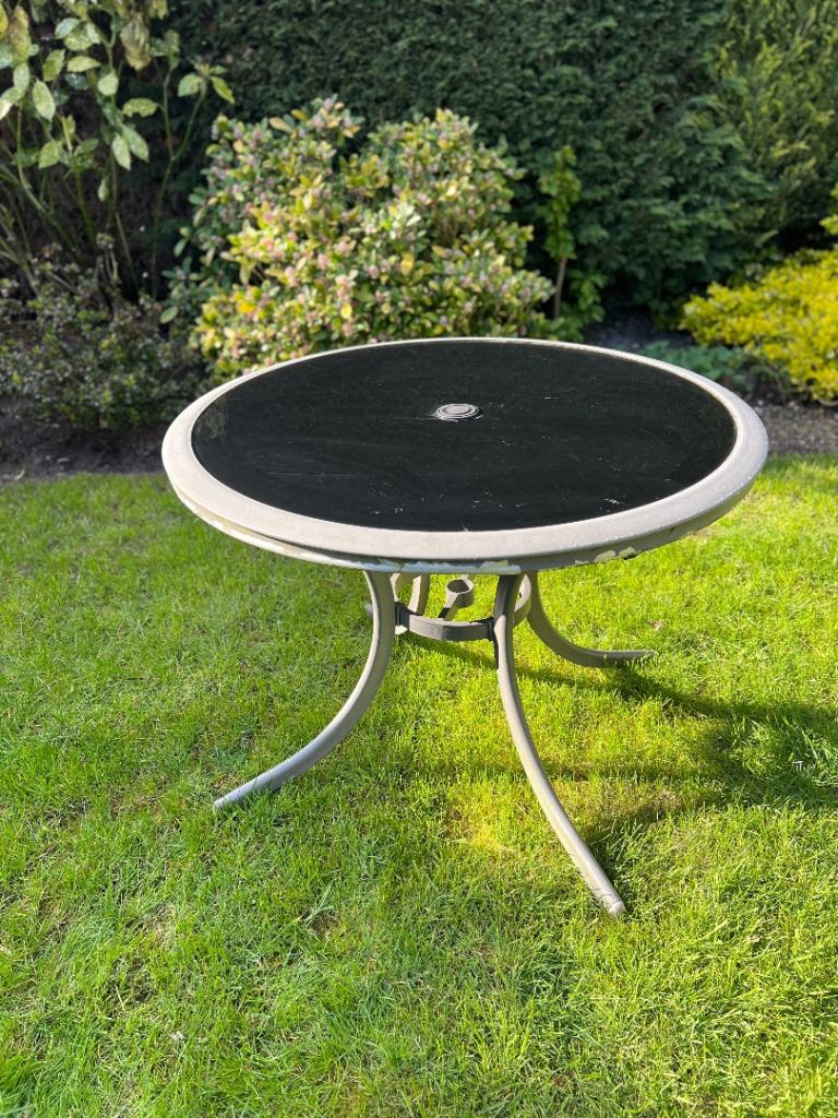 Glass round garden table 