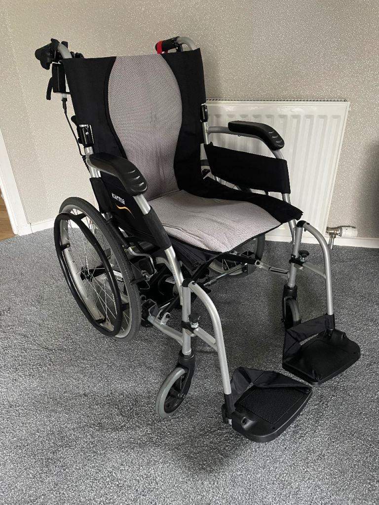 Karma ergo lite self propelled wheelchair with power stroll motor in excellent condition